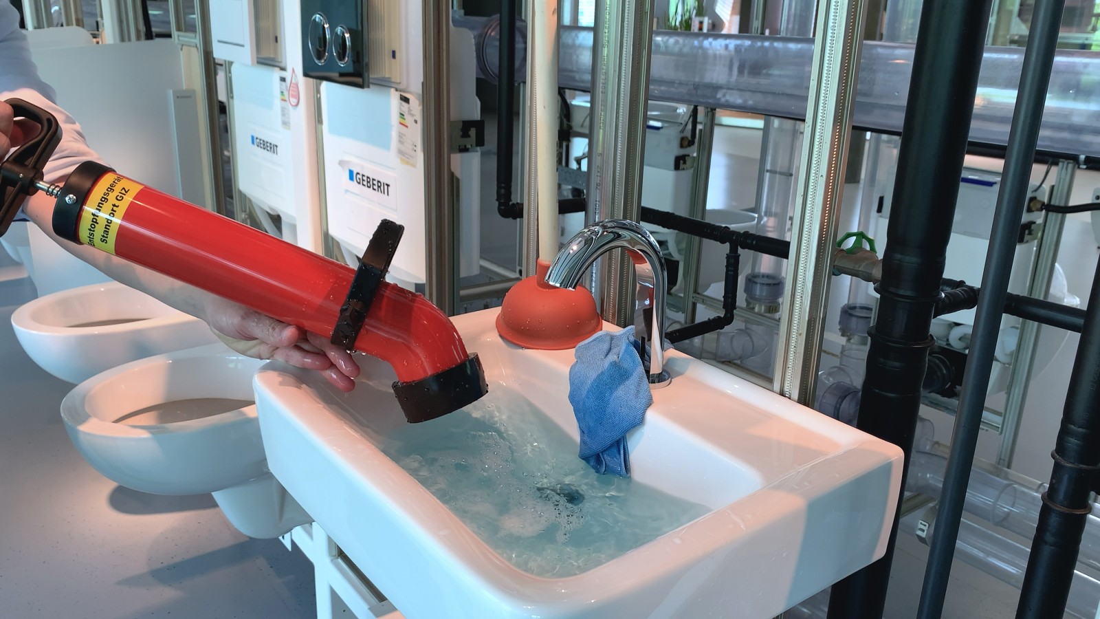 A pressure pipe cleaner in use A pressure pipe cleaner in use