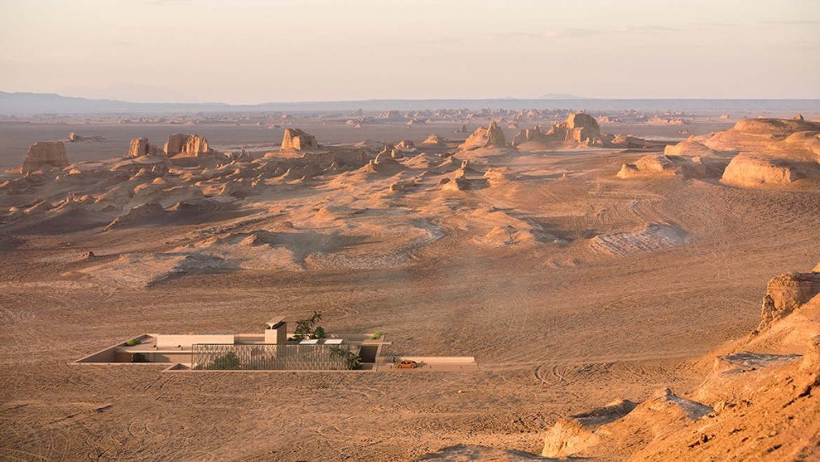 H.O.M.E. Haus 2022 nel deserto. Il bâdgir, la tradizionale torre del vento, si innalza da terra come una maestosa scultura (© Bloomrealities/HTA für H.O.M.E. Haus 2022)