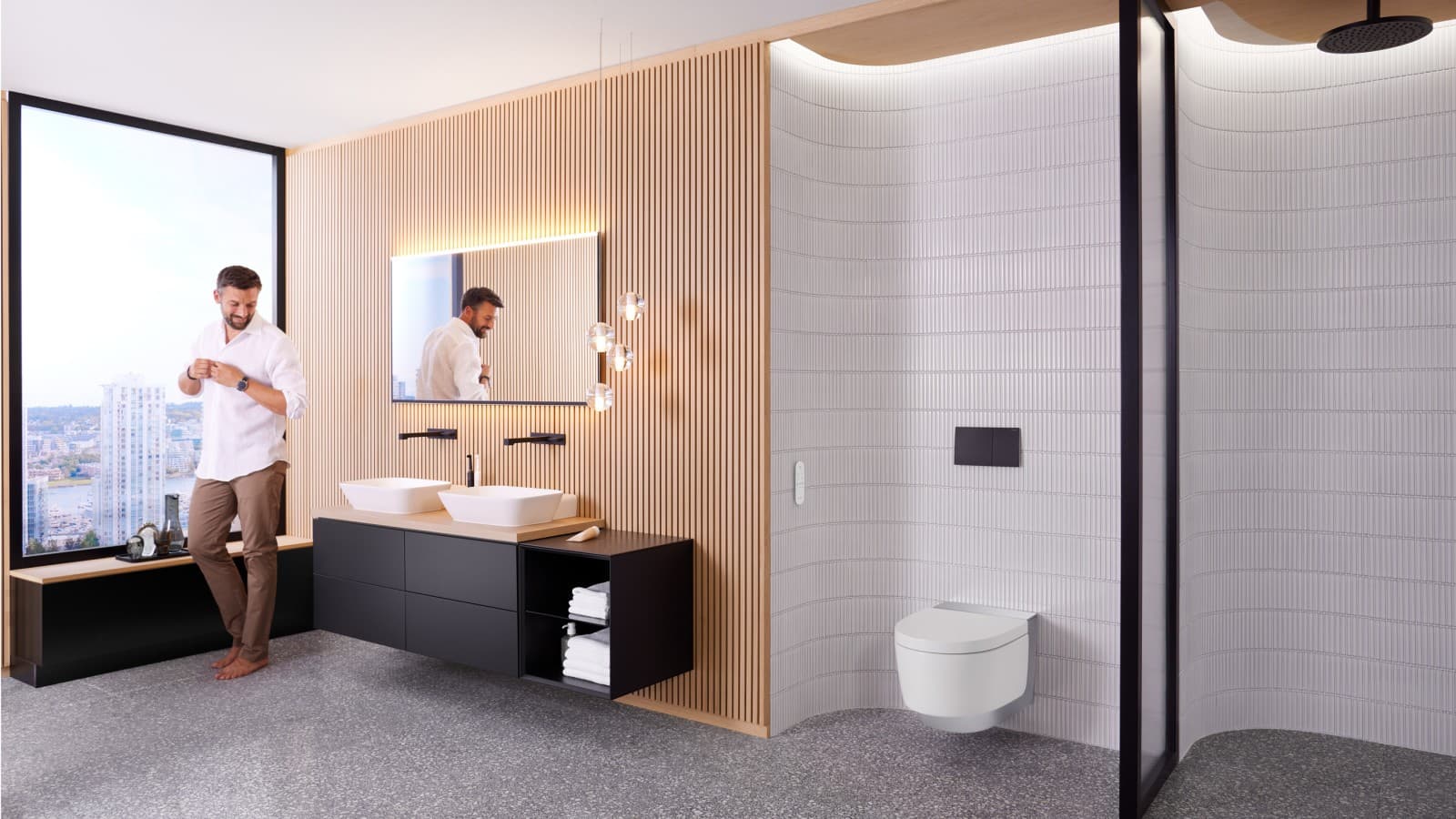 Uomo in bagno Geberit ONE con Geberit AquaClean Mera e specchio Geberit Option Plus Uomo in bagno Geberit ONE con Geberit AquaClean Mera e specchio Geberit Option Plus